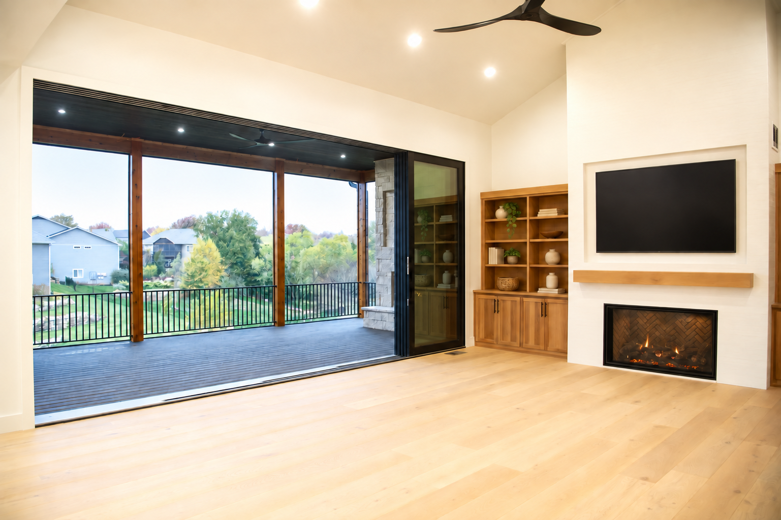 Completed great room opening to a covered terrace